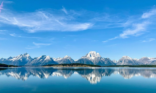 Mountains behind water with reflection